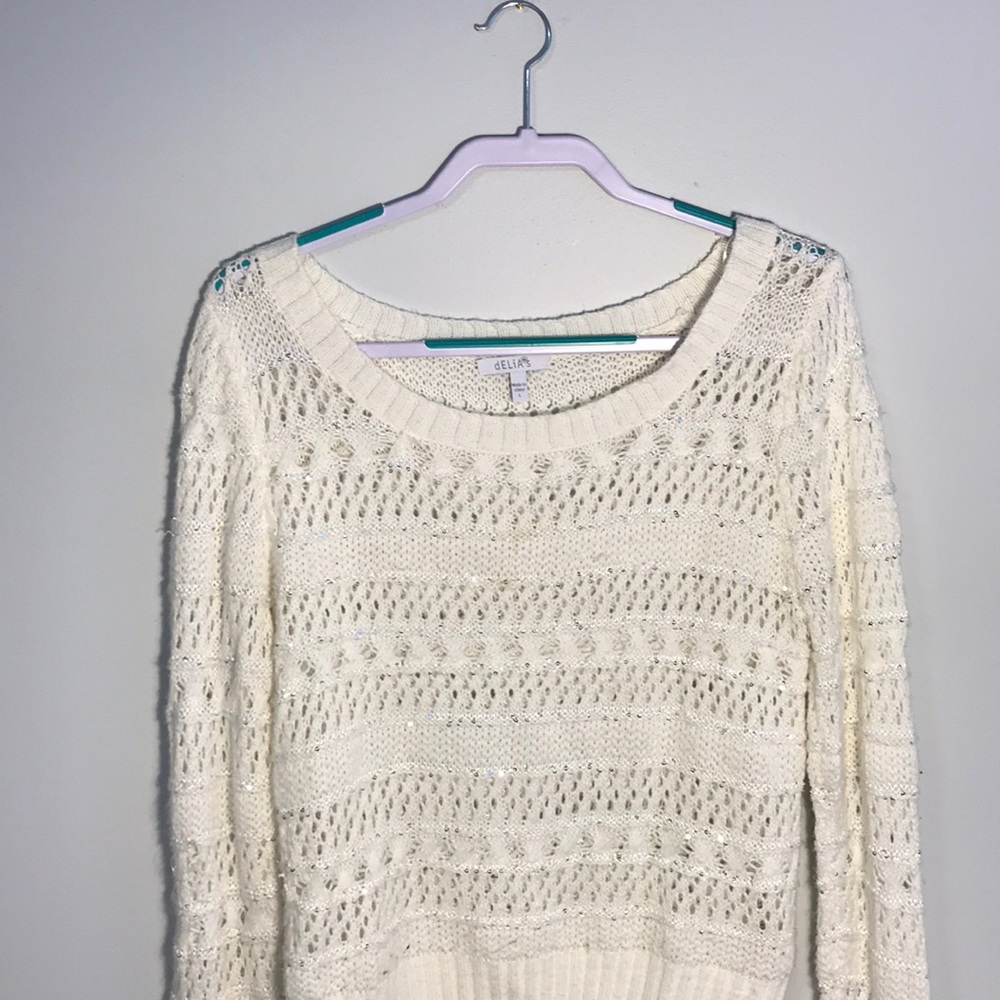 Cozy white sweater with sparkle